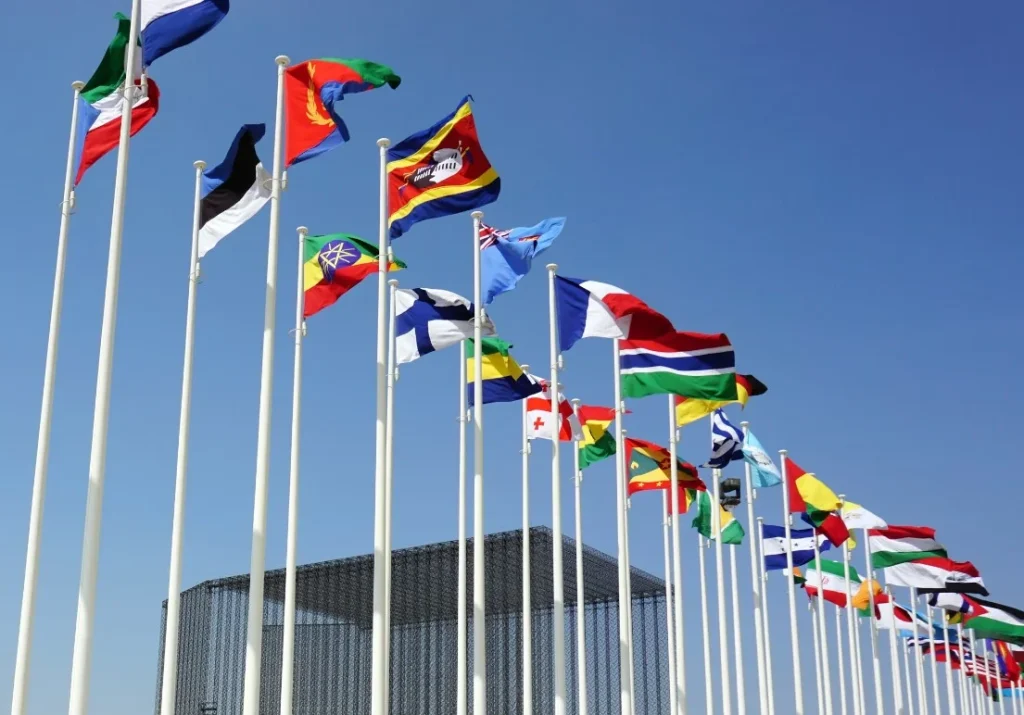 a-bunch-of-flags-that-are-flying-in-the-air-mIalf