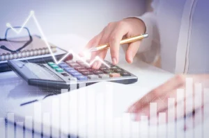 accountant-calculating-profit-with-financial-analysis-graphs